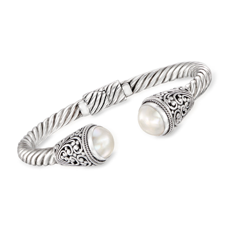 Sterling silver pearl cuff bracelet with braided rope links and filigree end caps