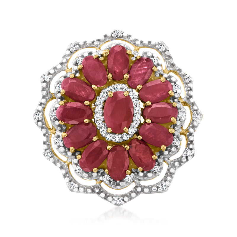 Floral ruby and diamond ring in gold-tone setting with oval red gemstones and sparkling halo