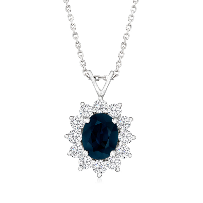 14kt white gold pendant necklace with oval dark blue sapphire center and diamond halo