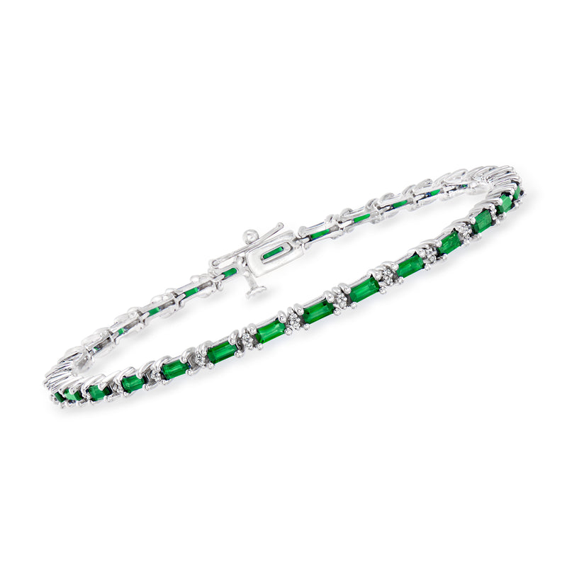 14kt white gold tennis bracelet with emerald green stones and diamond accents