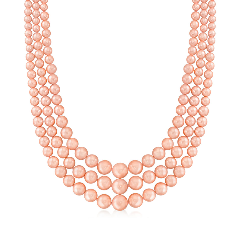 Graduated peach shell pearl three-strand necklace with rounded pearl links