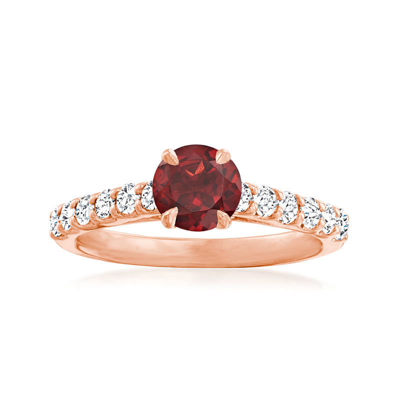 14kt rose gold vintage ring with dark red garnet center and round diamond accents