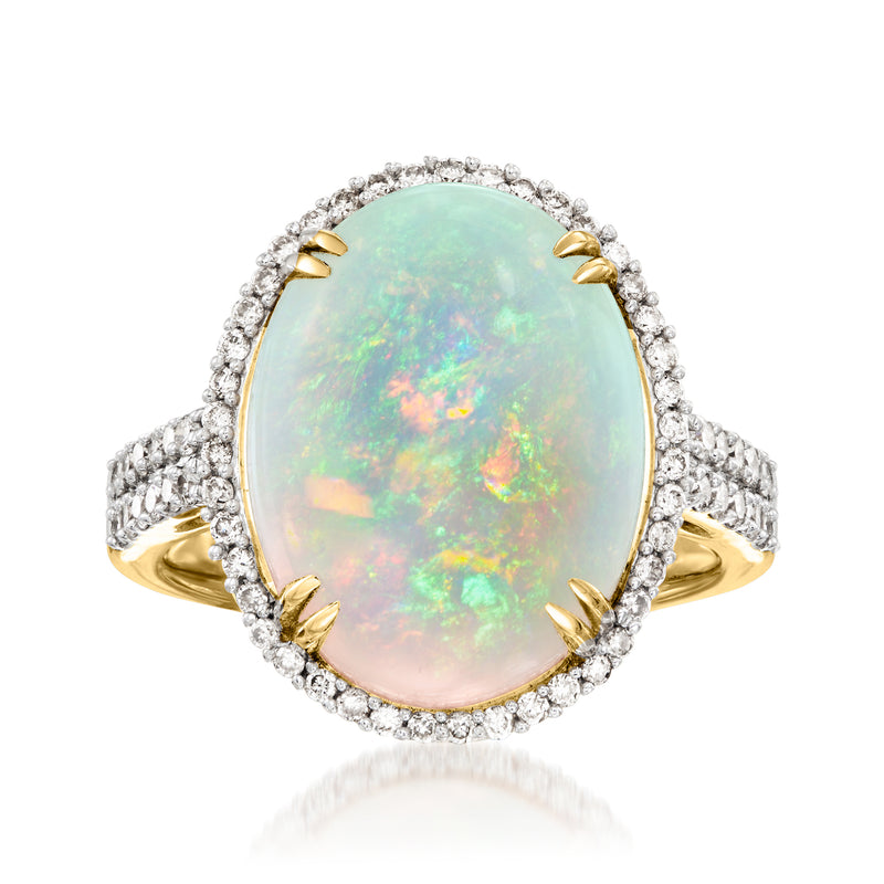 Oval Ethiopian opal ring with diamond halo and yellow gold prong setting