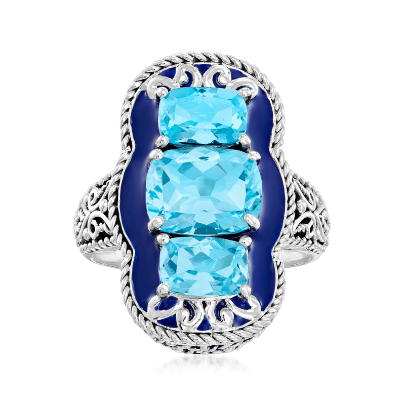 Sterling silver ring with three sky blue topaz stones and blue enamel bezel