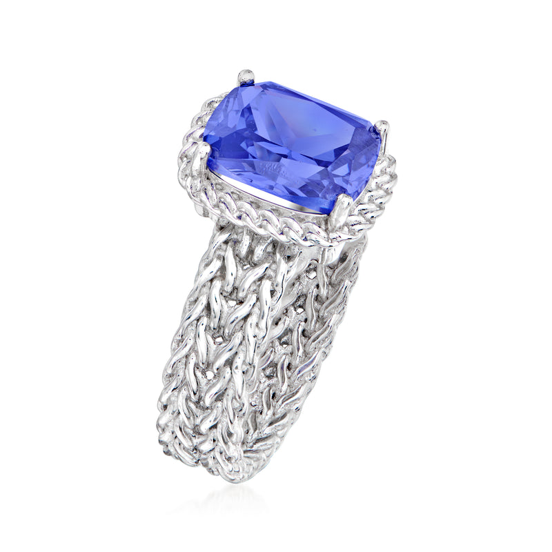 Sterling silver simulated tanzanite ring with large oval blue stone, basketweave band