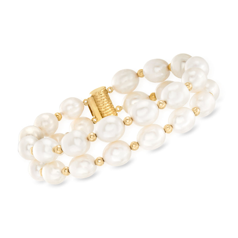 Two-row cultured pearl bracelet with 14kt yellow gold links and round white pearls