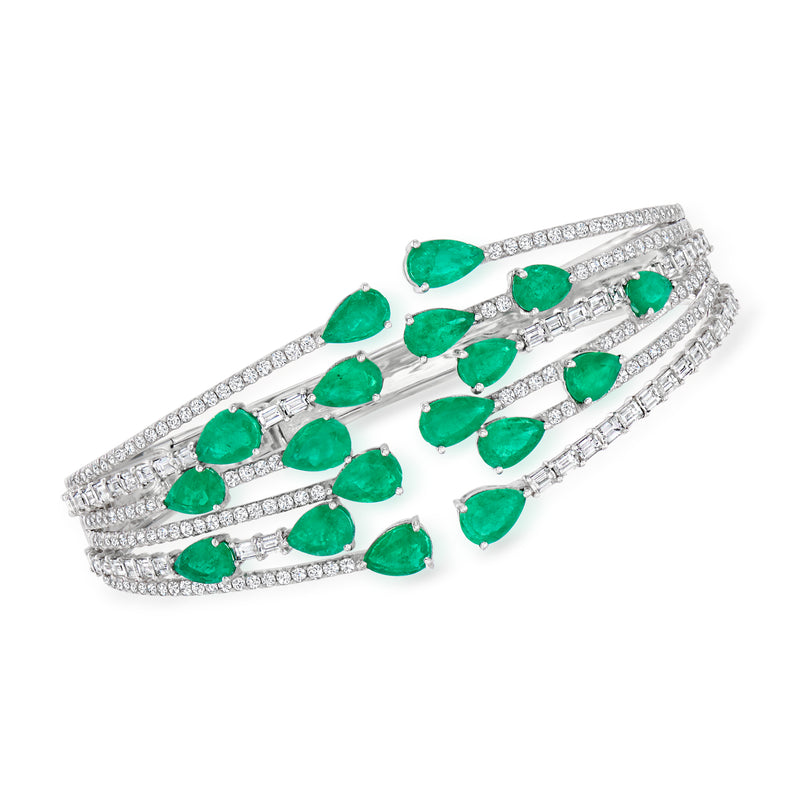 18kt white gold diamond and emerald bangle bracelet with oval green emerald stones