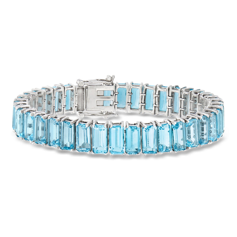 Sky blue topaz tennis bracelet in sterling silver with rectangular blue stones