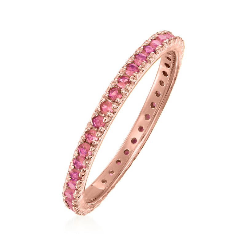 Rose gold eternity band with pink gemstones and scalloped prong setting, side view