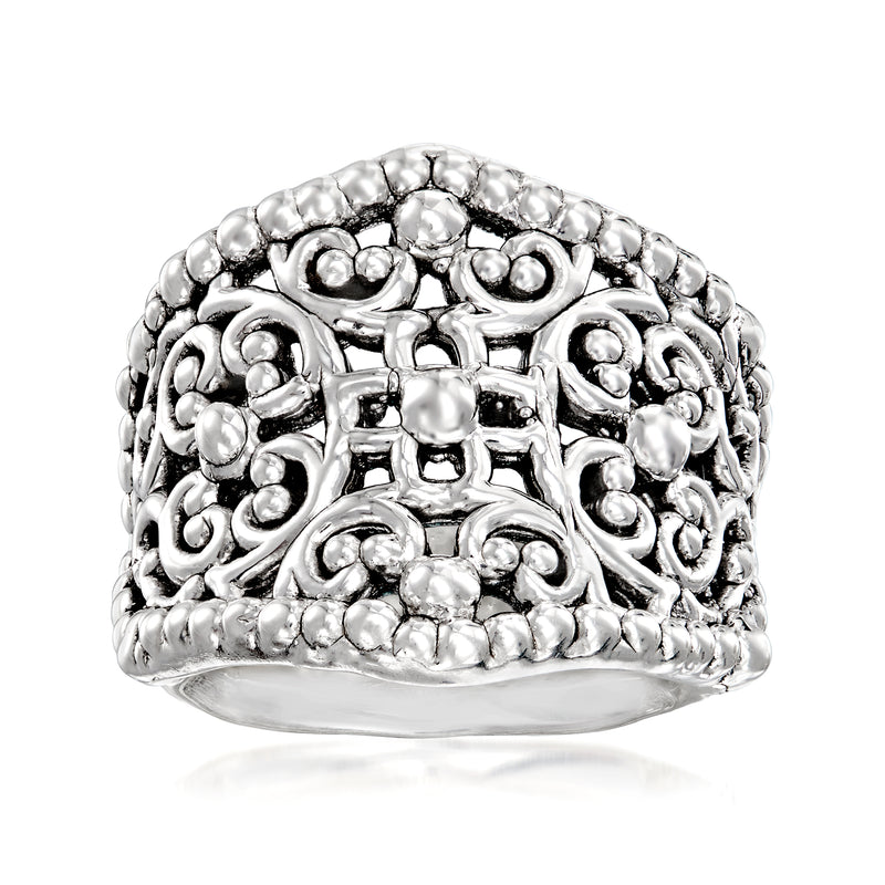 Sterling silver filigree ring with raised scrollwork and glossy oval settings