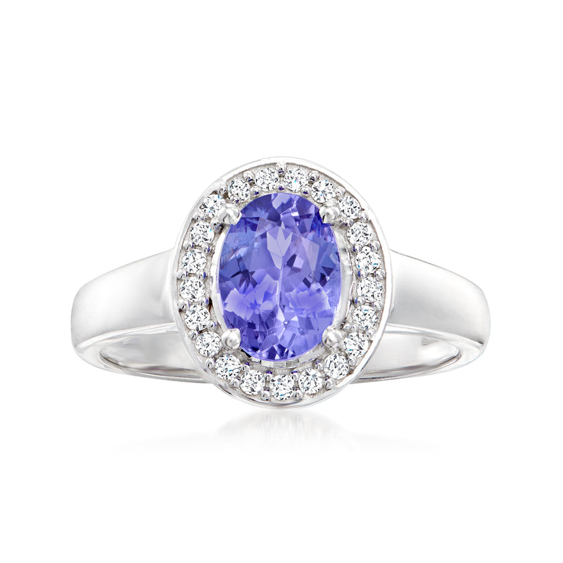 Oval tanzanite halo ring with diamond pave surround, 14kt white gold band