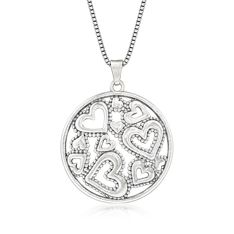 Sterling silver heart pendant necklace with round openwork heart design, link chain