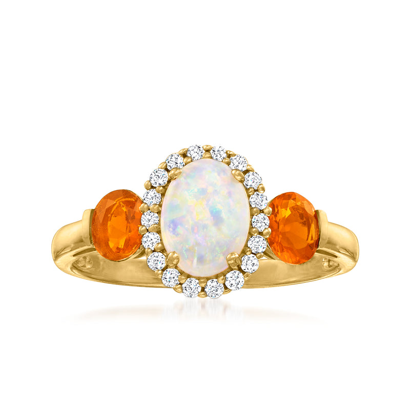 14kt yellow gold ring: oval opal center, diamond halo, orange side gems