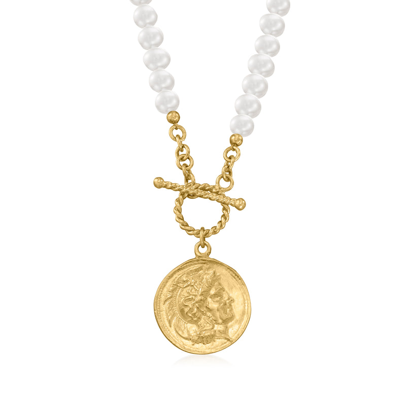 Cultured pearl charm necklace with gold Roman coin pendant and chain links.
