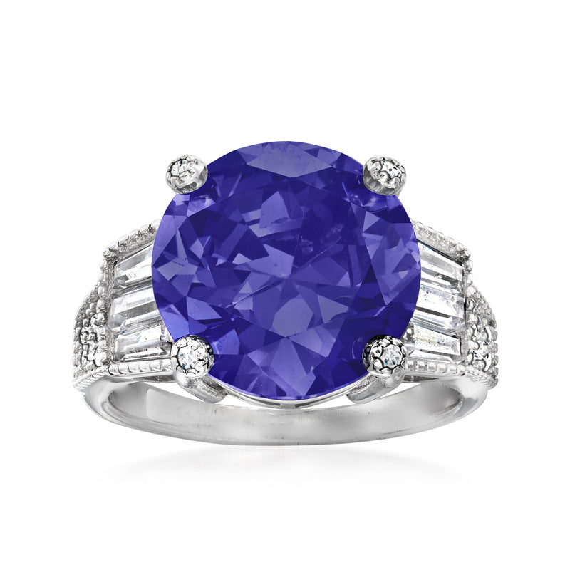 Sterling silver ring with large round simulated tanzanite-style gemstone and CZ side accents