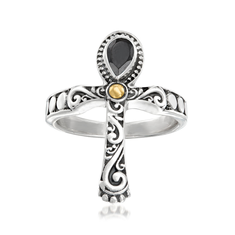 Sterling silver Bali-style cross ring with dark oval center stone and small gold bead accent
