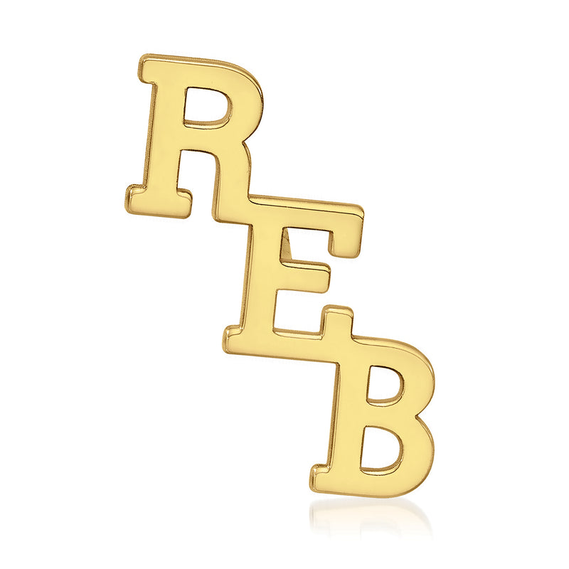 14kt yellow gold cut-out tie tack with initials R E B