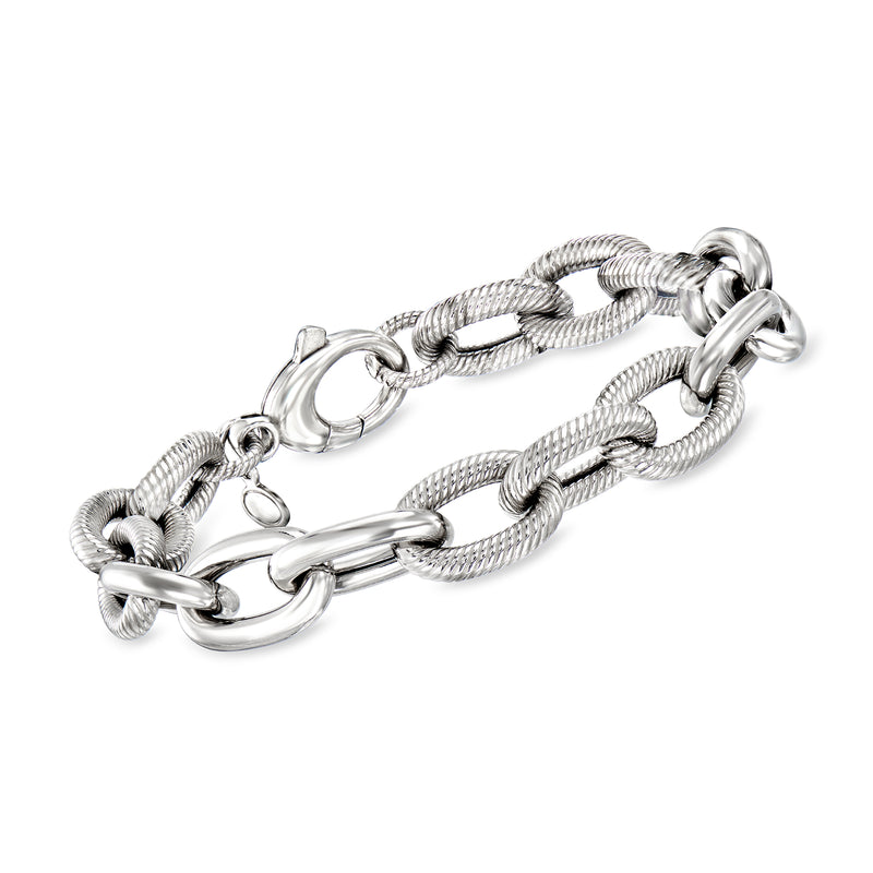 Sterling silver cable-link bracelet with round clasp and interwoven chain links