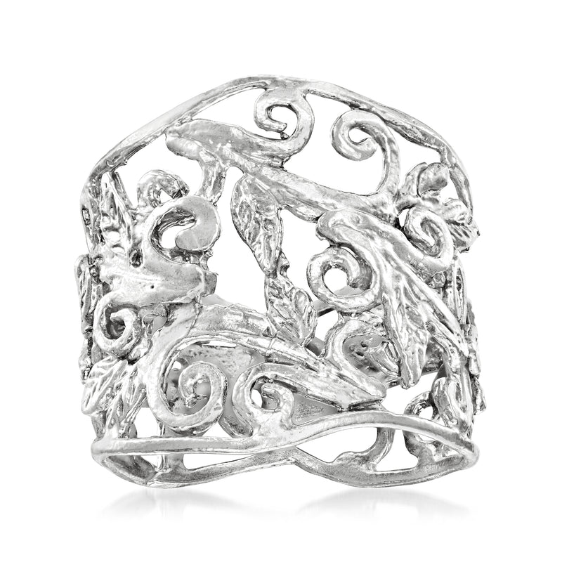 Sterling silver scrollwork ring with openwork filigree and circular cutouts