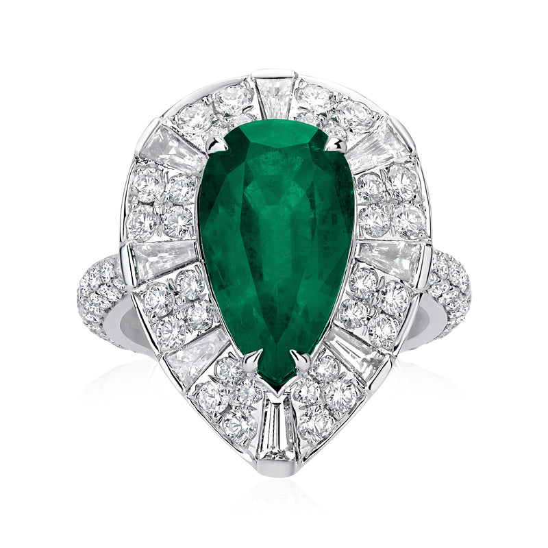 Emerald-cut green gemstone halo ring in 18kt white gold with diamond accents