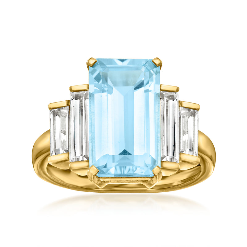 18kt gold over sterling ring with sky blue topaz center and baguette white topaz side stones
