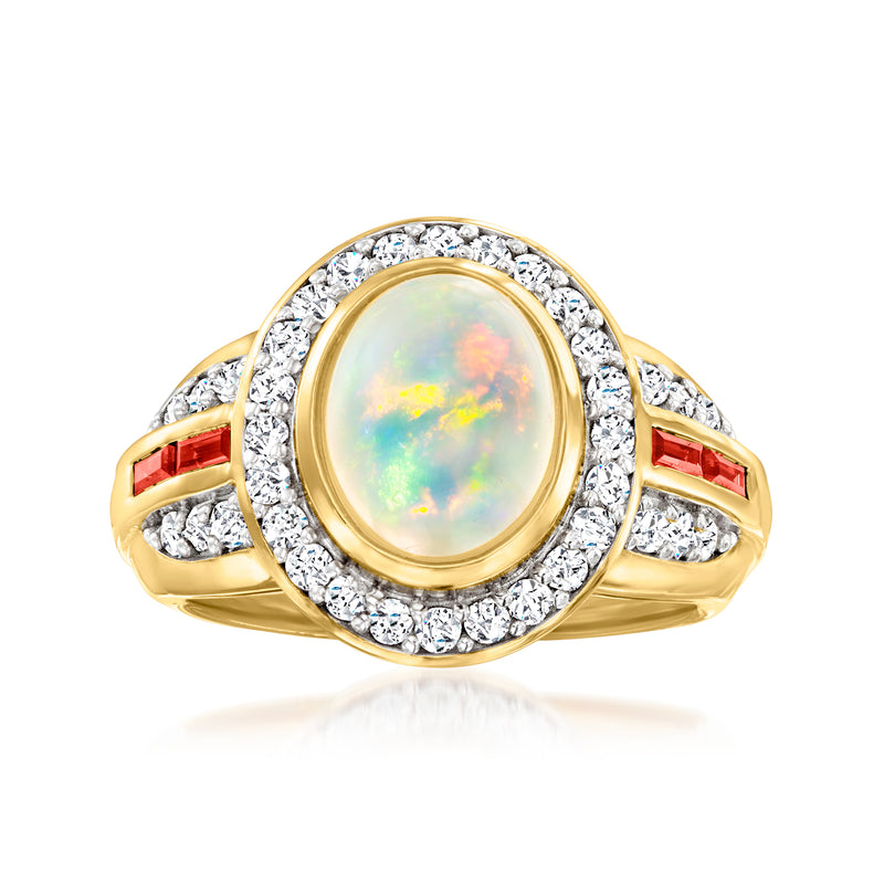 Gold halo ring with oval Ethiopian opal center, white zircon border, red side stones