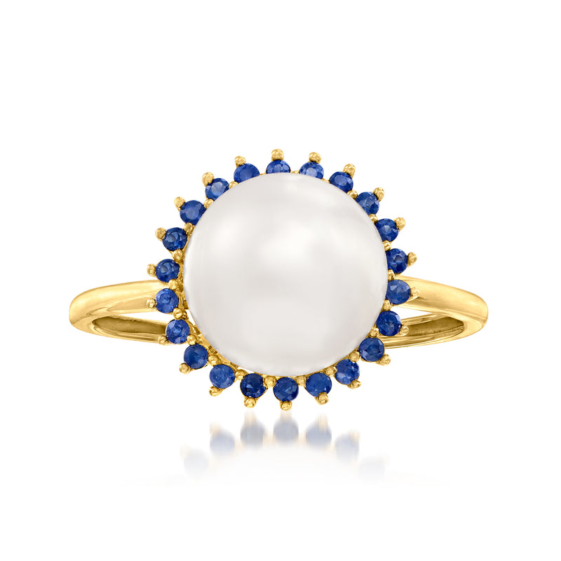 14kt yellow gold ring with large white cultured pearl center and blue sapphire halo