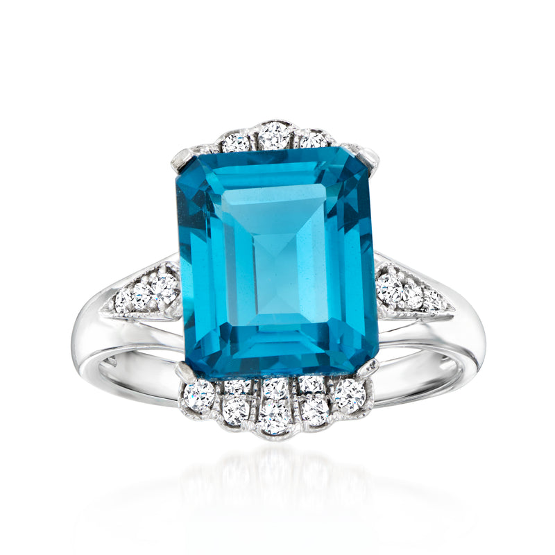 14kt white gold ring with emerald-cut London blue topaz and diamond halo band