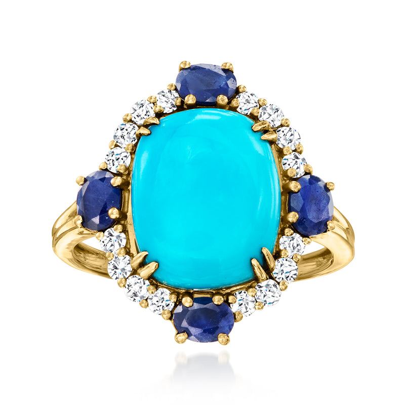 Oval turquoise gemstone ring in 14kt yellow gold with diamond halo and blue sapphire accents