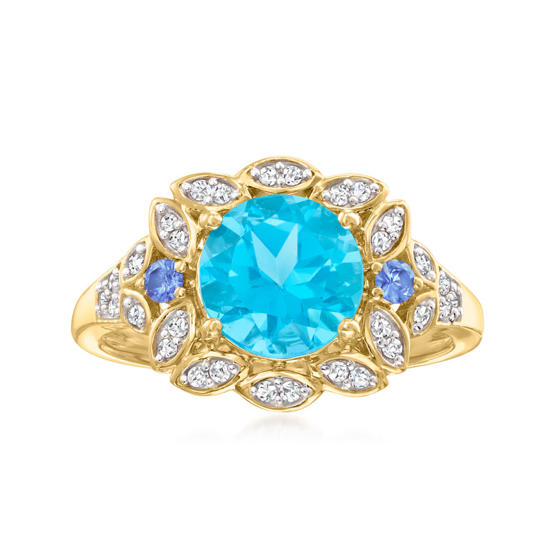 14kt yellow gold ring with oval Swiss blue topaz, diamond halo, sapphire side stones