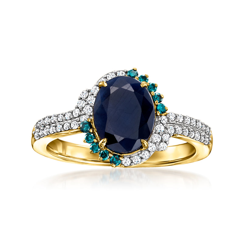 Oval sapphire gemstone ring in 14kt yellow gold with blue and white diamond accents