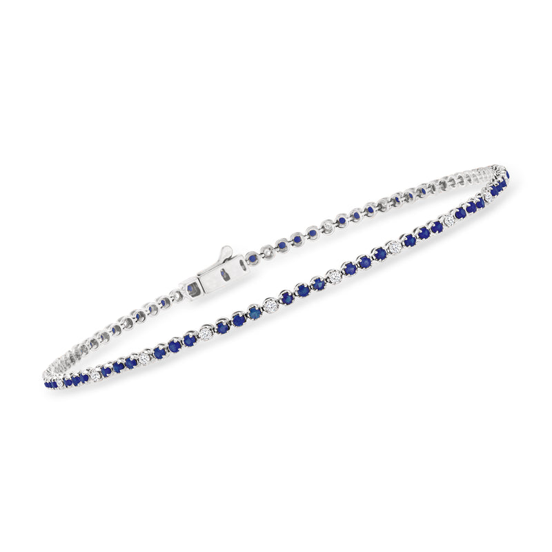 14kt white gold tennis bracelet with round blue sapphire and diamond bezel links