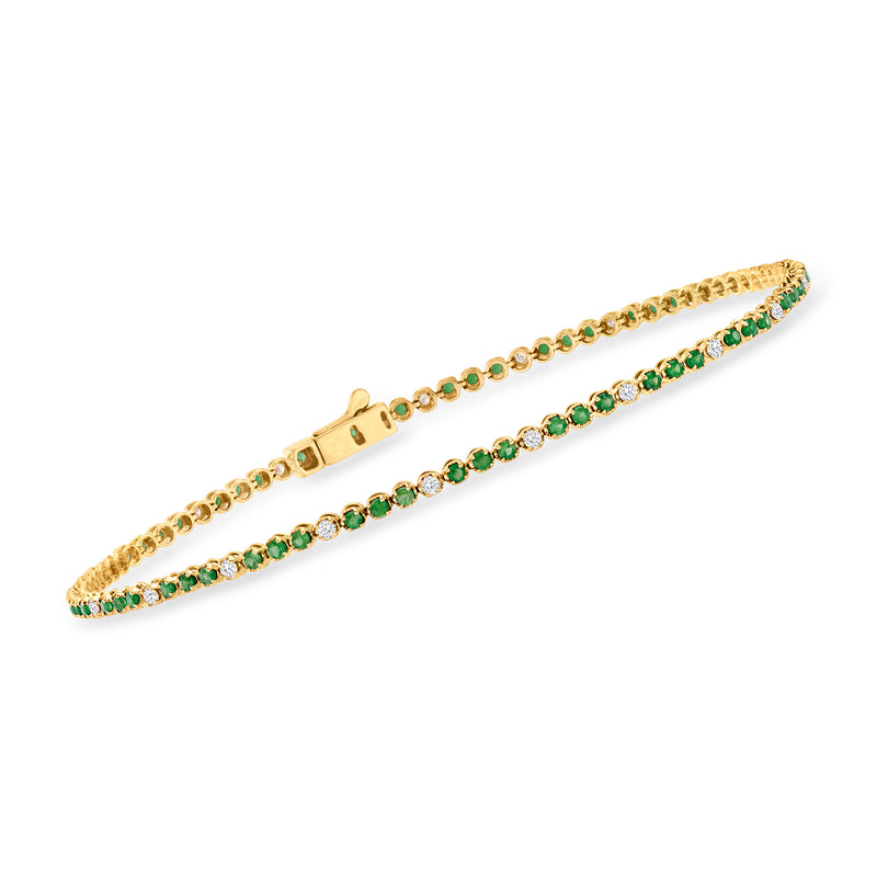 14kt yellow gold tennis bracelet with green emerald stones and clear diamond accents