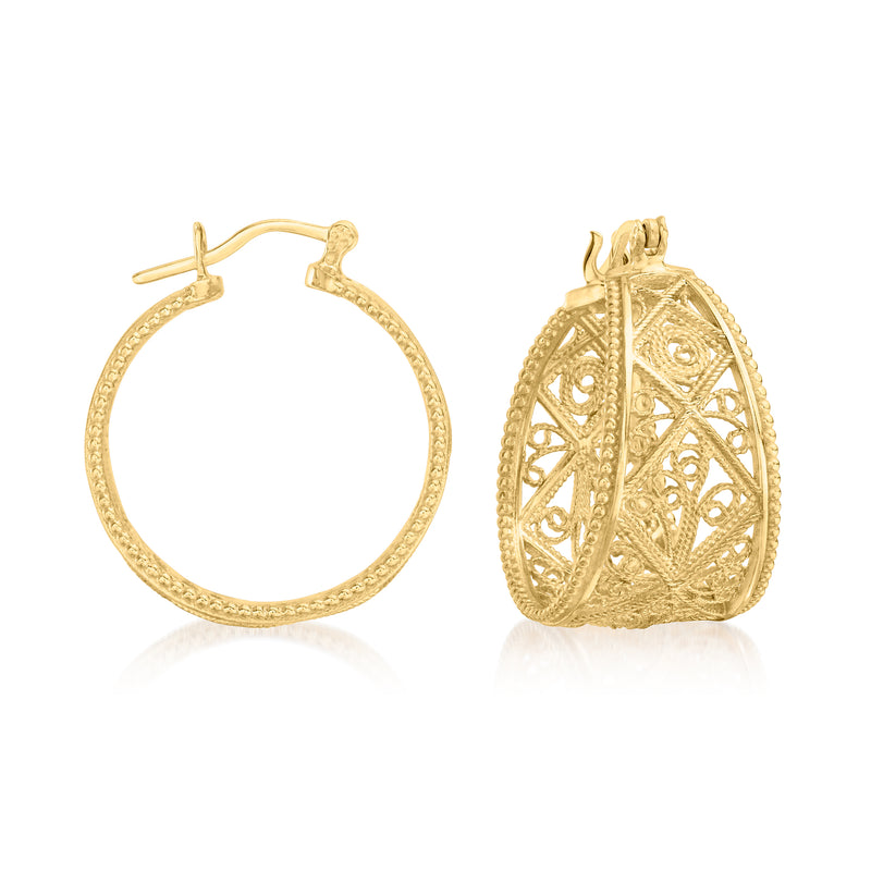 Gold-tone openwork filigree hoop earrings, round with ornate cutout pattern and hinged back