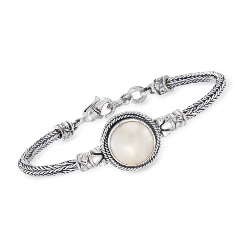 Sterling silver pearl bracelet with braided rope chain and round white Mabe bezel