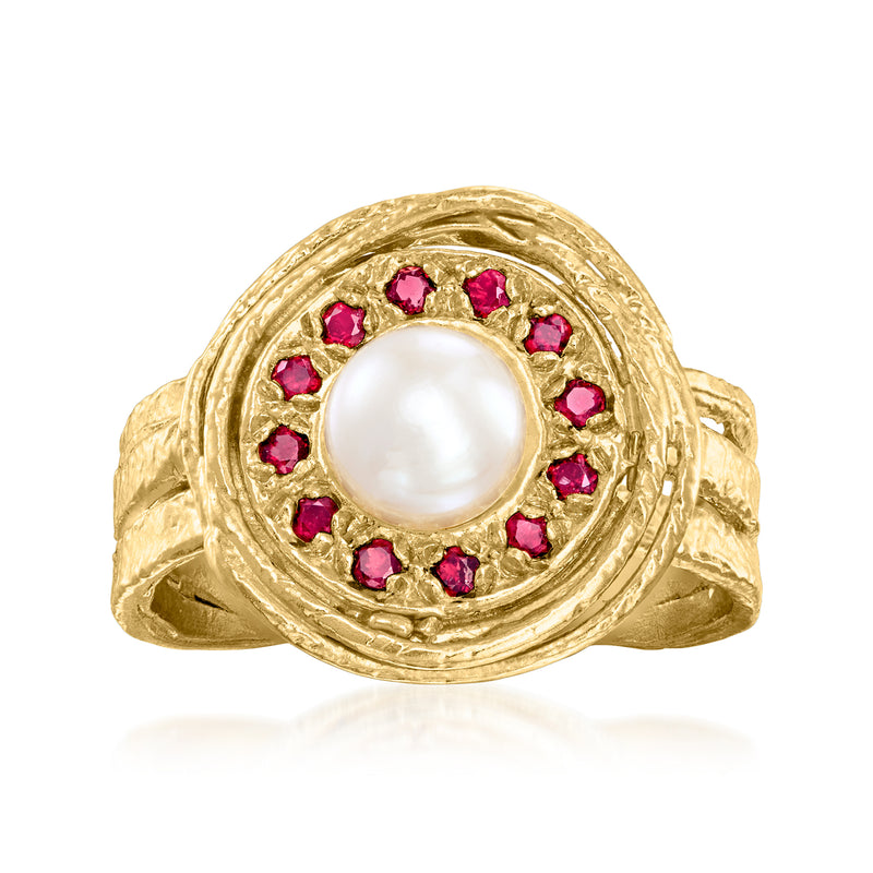 Gold-tone halo ring with round white pearl center and pink garnet bezel accents