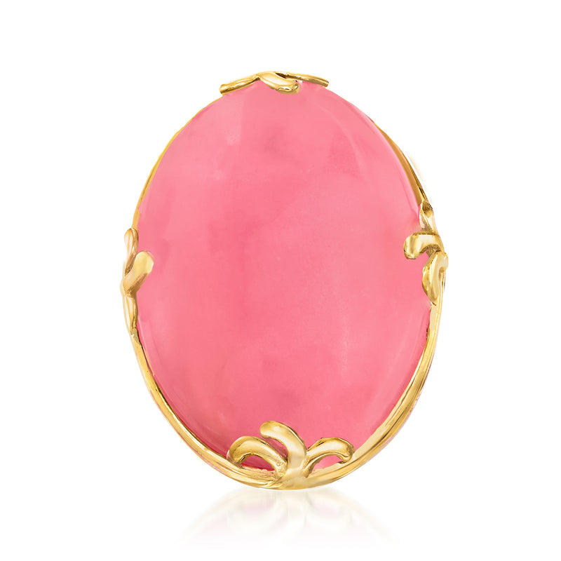 Oval pink jade ring with gold-tone bezel and prong setting on sterling