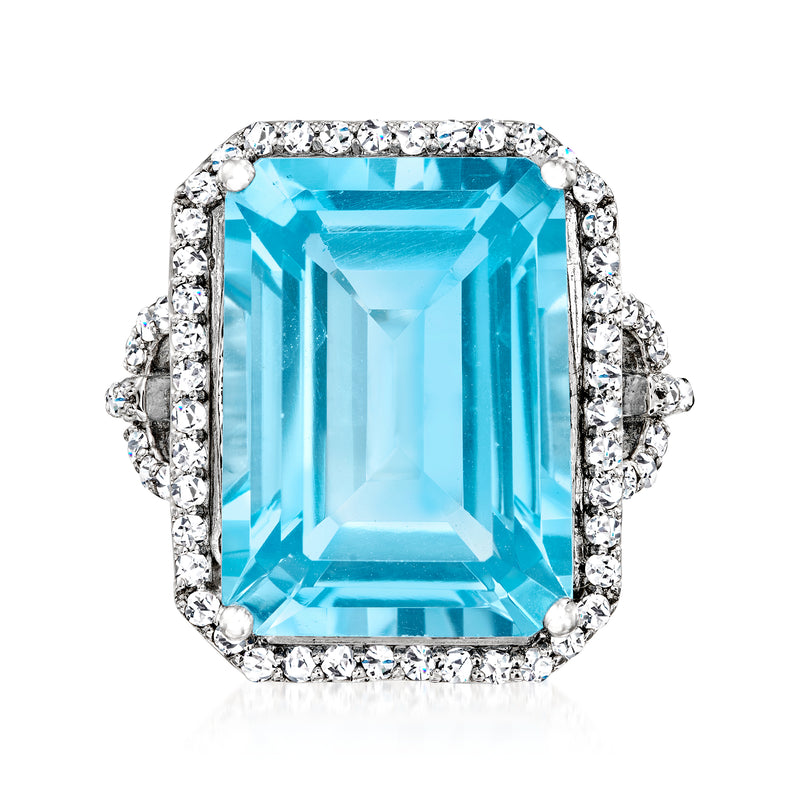 Sterling silver ring with large rectangular Swiss blue topaz center and white topaz halo