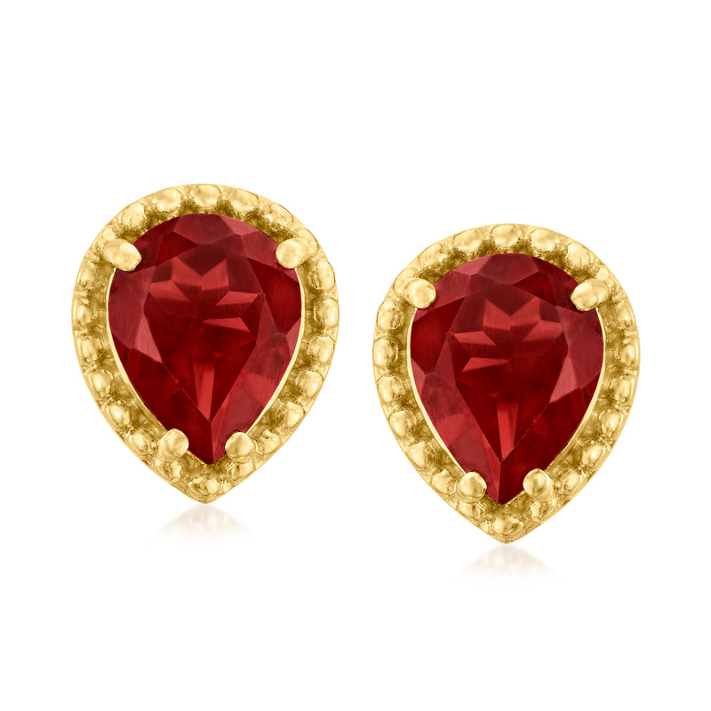 Teardrop garnet stud earrings with red gemstone and gold-tone halo bezel