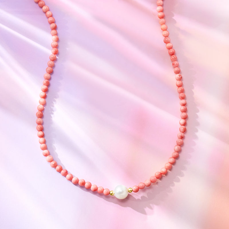 Pink coral bead necklace with white cultured pearl and gold connector detail