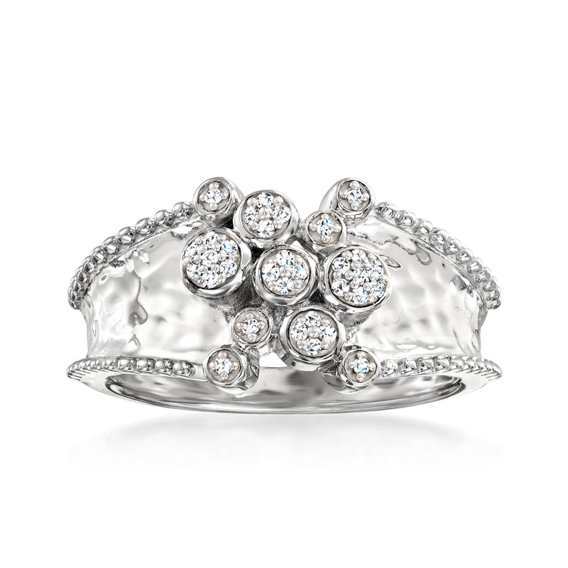 Sterling silver bubble ring with round clear diamond-like stones and textured band.