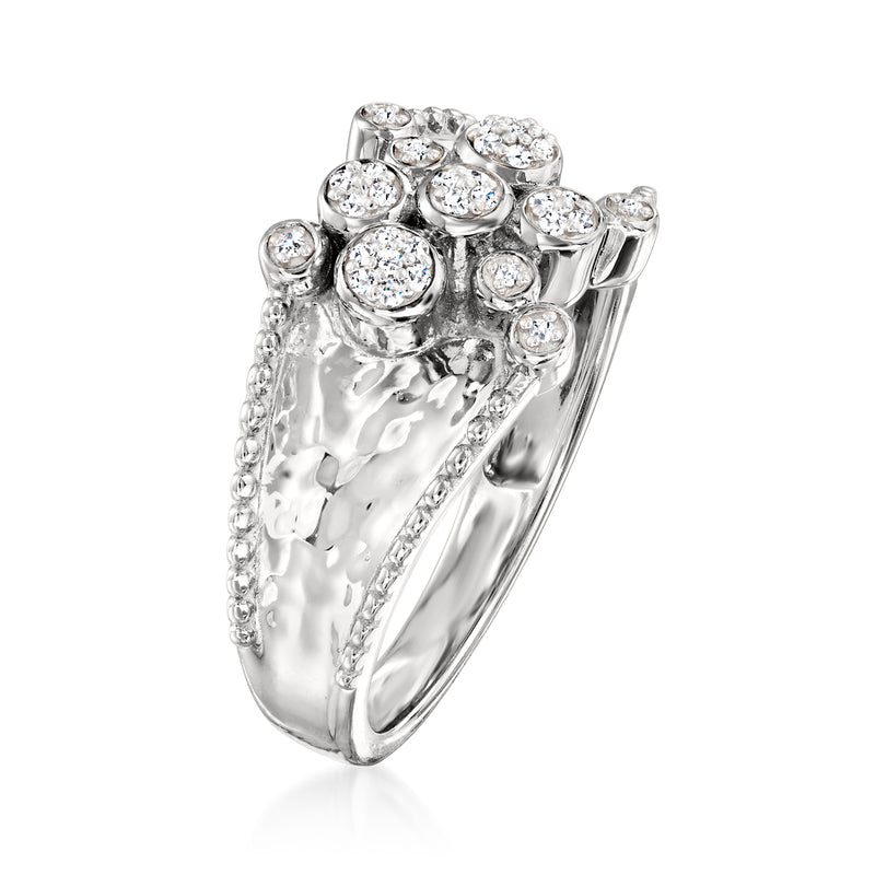 Sterling silver bubble diamond ring with round stones, side view of textured band.
