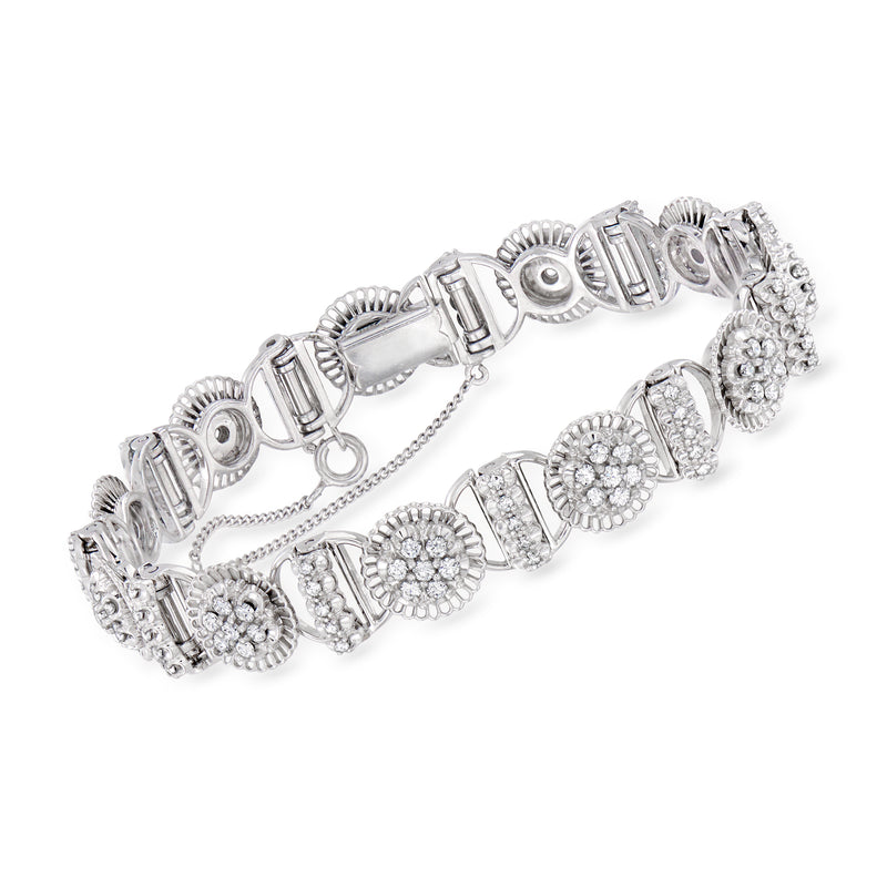Vintage diamond cluster tennis bracelet in 18k white gold, oval and round bezels
