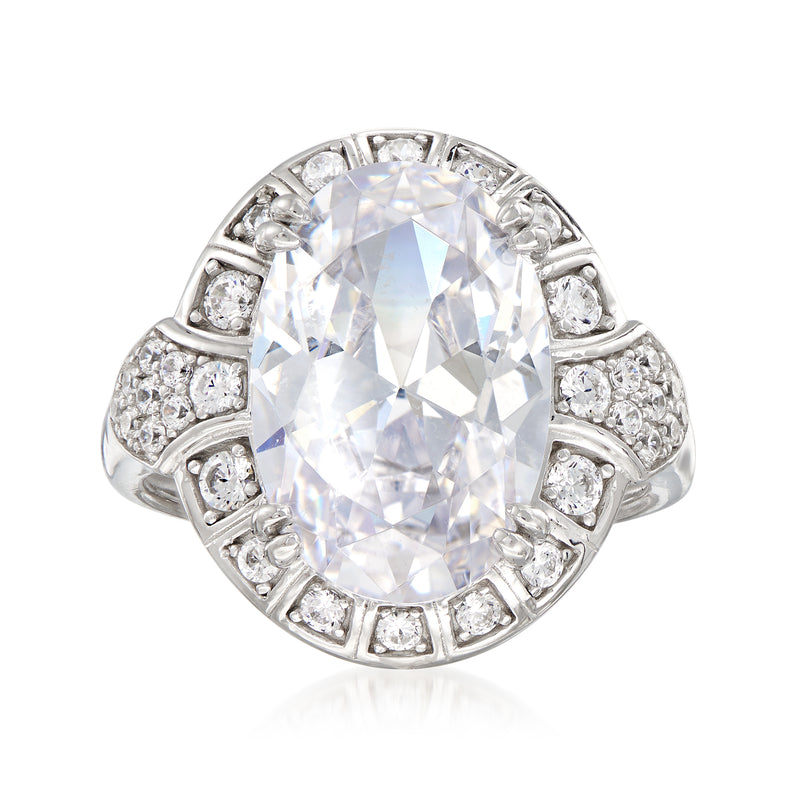 Sterling silver CZ halo ring with large round center stone and diamond-like side accents
