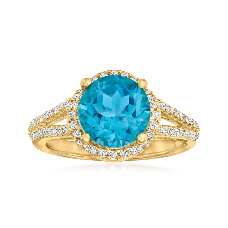 18kt gold over sterling ring with oval London blue topaz center and white zircon halo