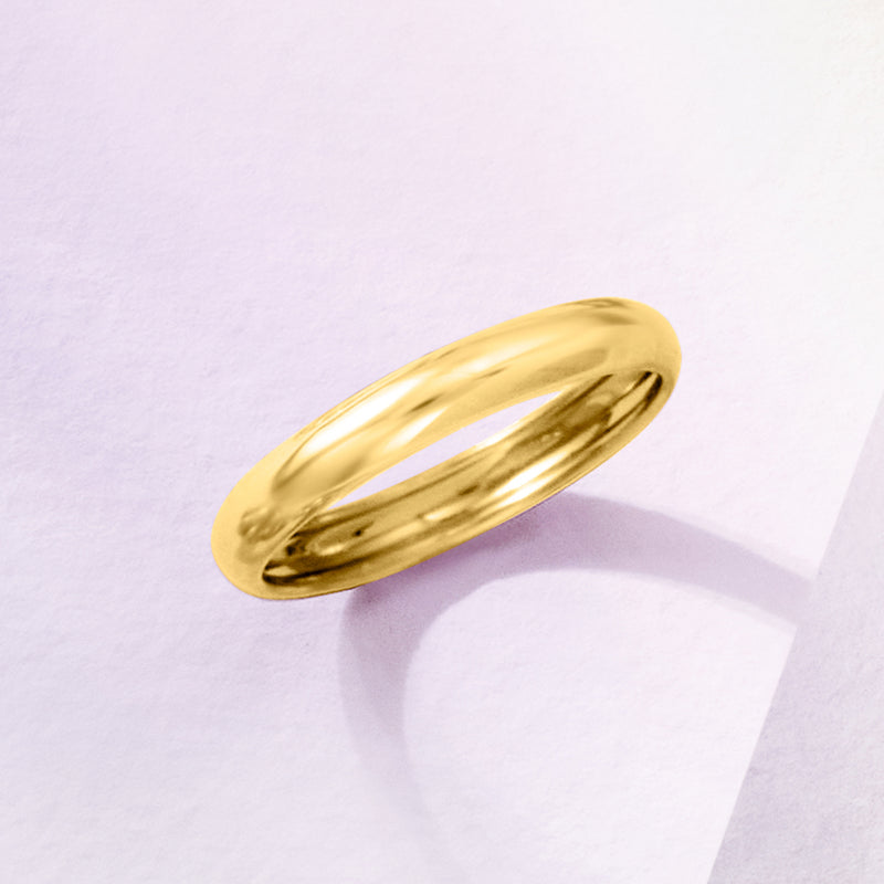 18kt yellow gold ring band with glossy finish, angled side view