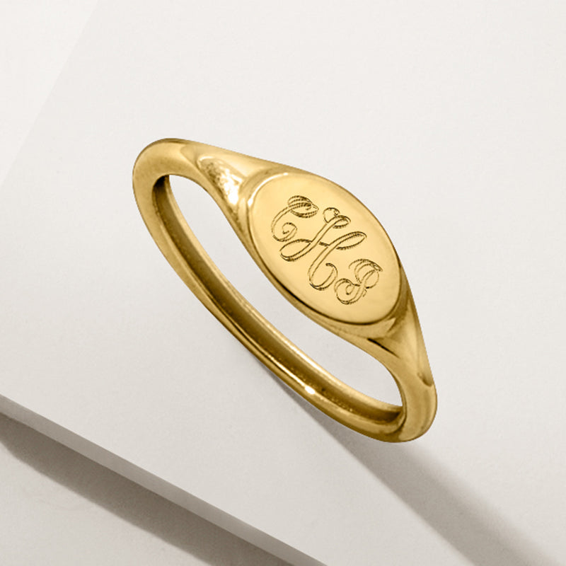 14kt yellow gold signet ring with personalized monogram engraving, angled view