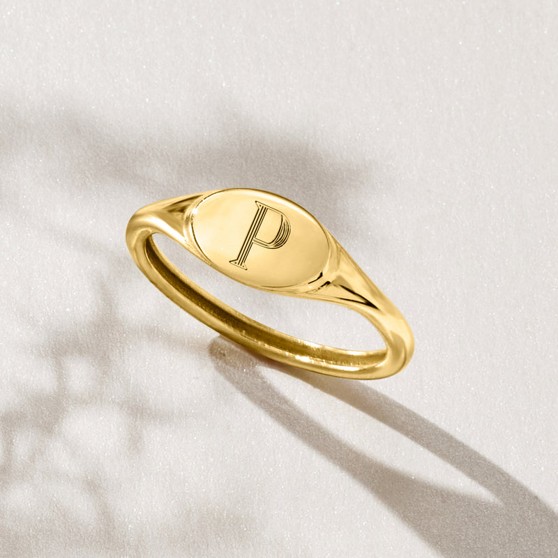 14kt yellow gold signet ring with letter P engraving, angled side view