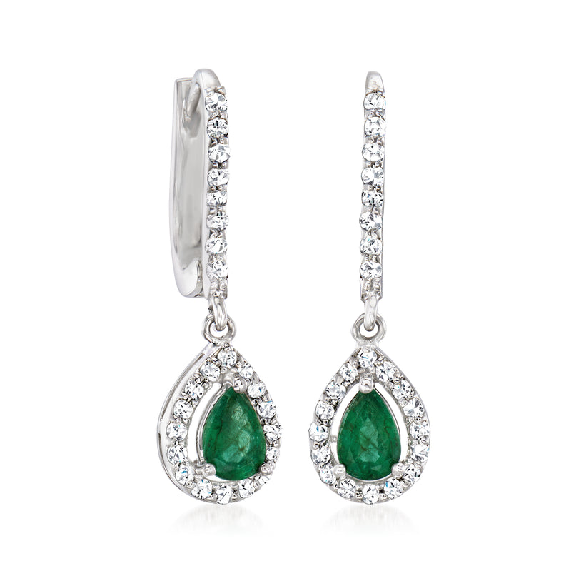 Emerald and diamond drop post earrings with green teardrop stone, angled side view