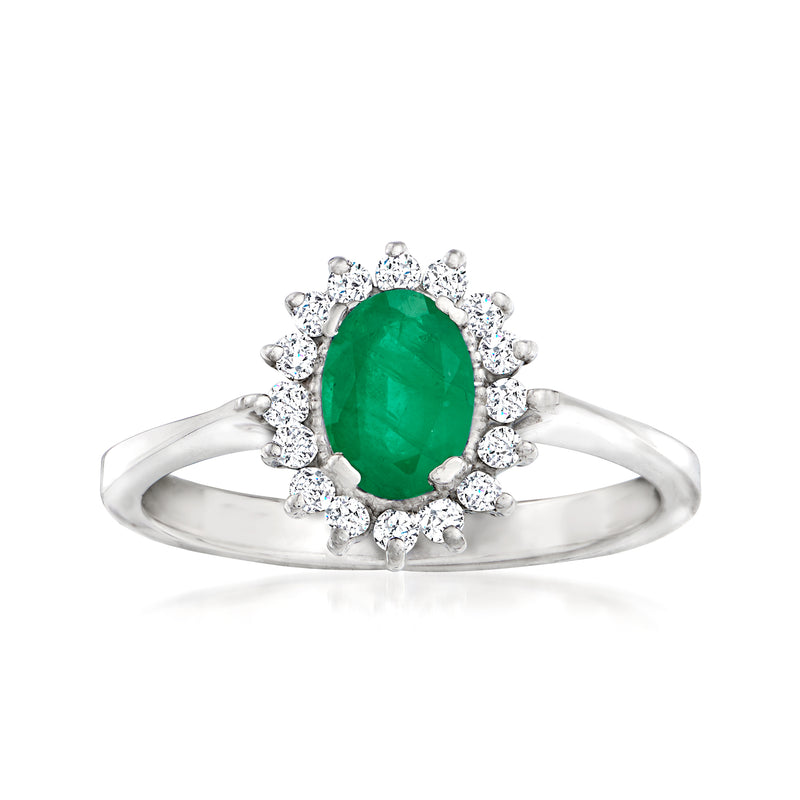 Green emerald-cut gemstone halo diamond ring in 18k white gold with oval center